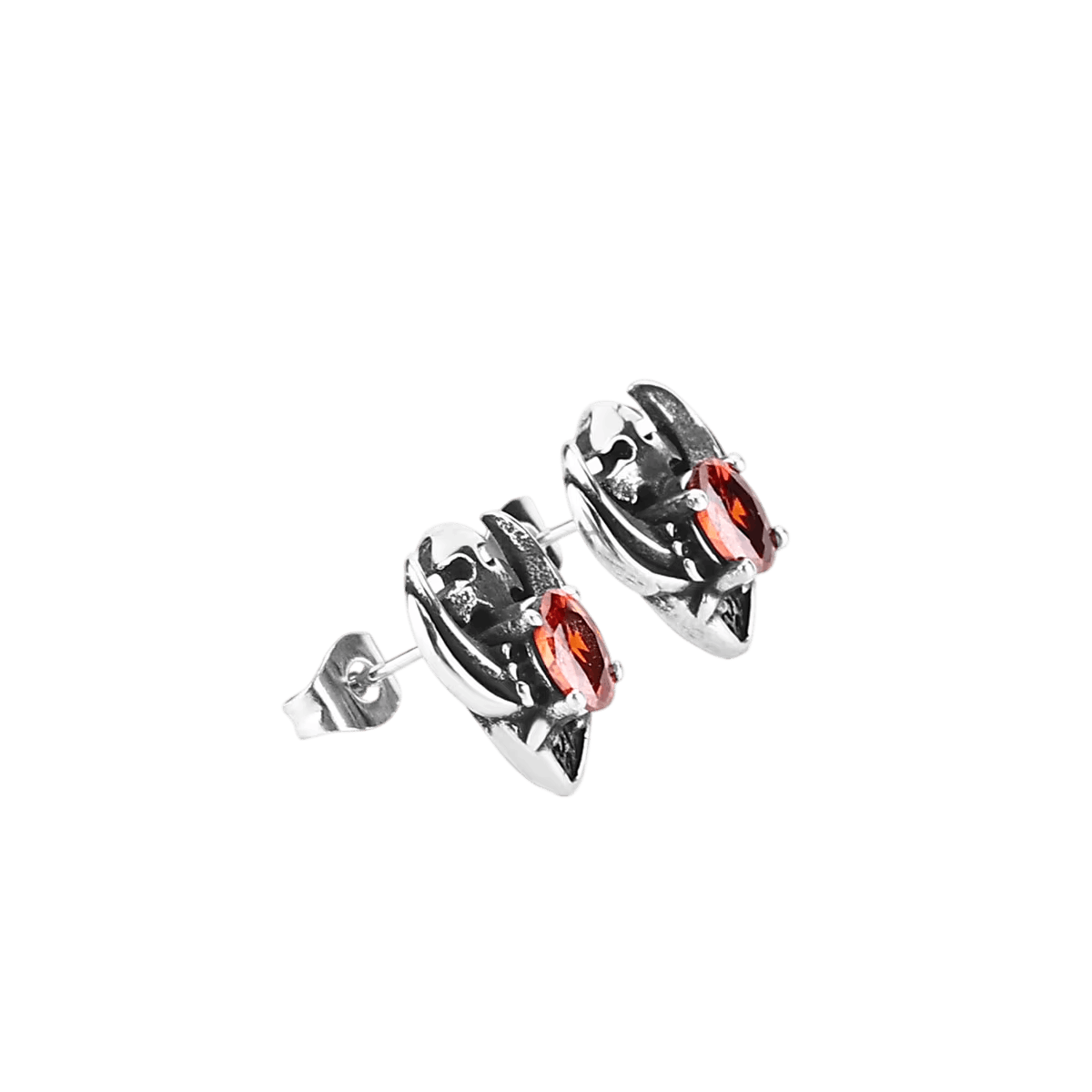 Puces d'oreilles en acier inoxydable, crâne gravé surmontant un zircon rouge ovale serti en biais