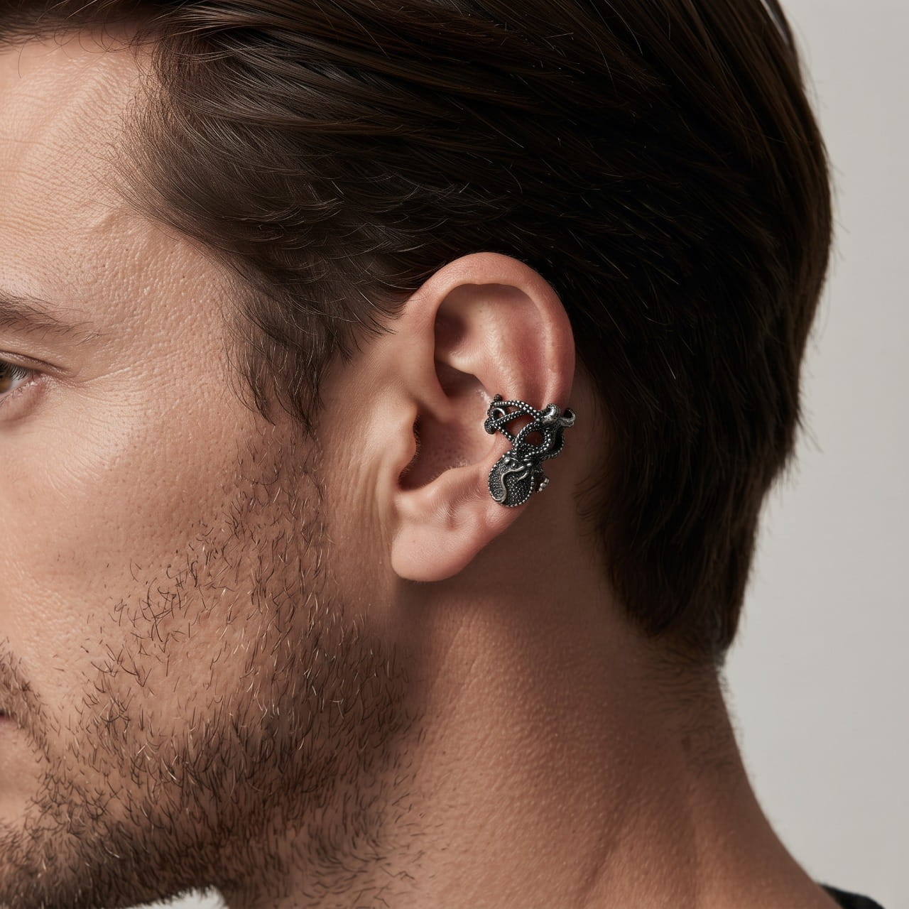 Clip d'oreille pieuvre en acier pincé sur le lobe, sans perçage