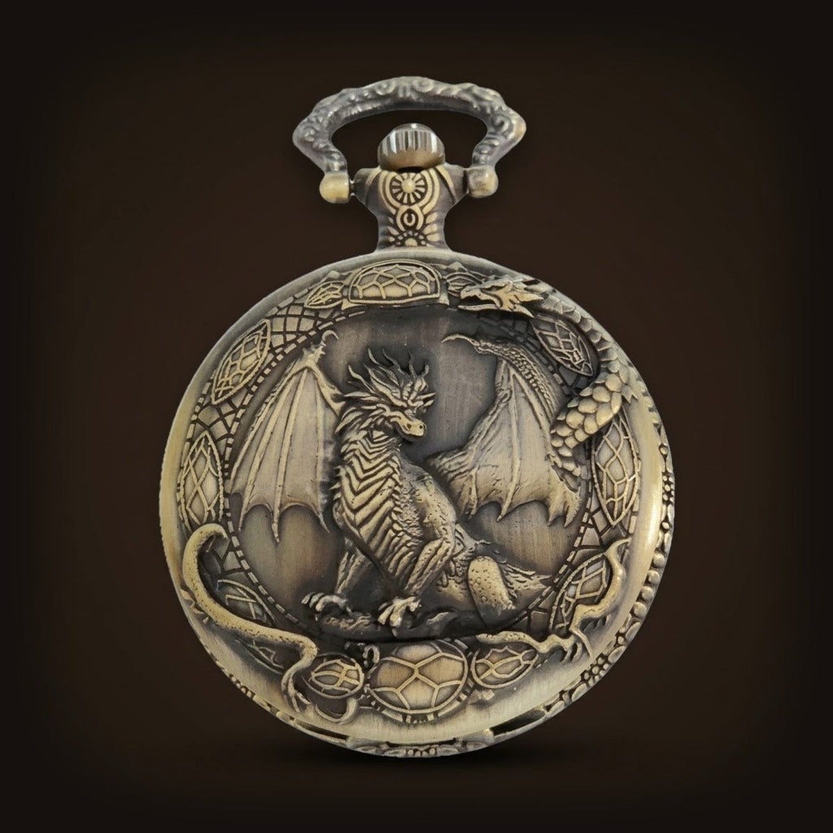 Montre gousset en bronze vieilli, couvercle orné d’un dragon ailé en relief entouré d’un second dragon