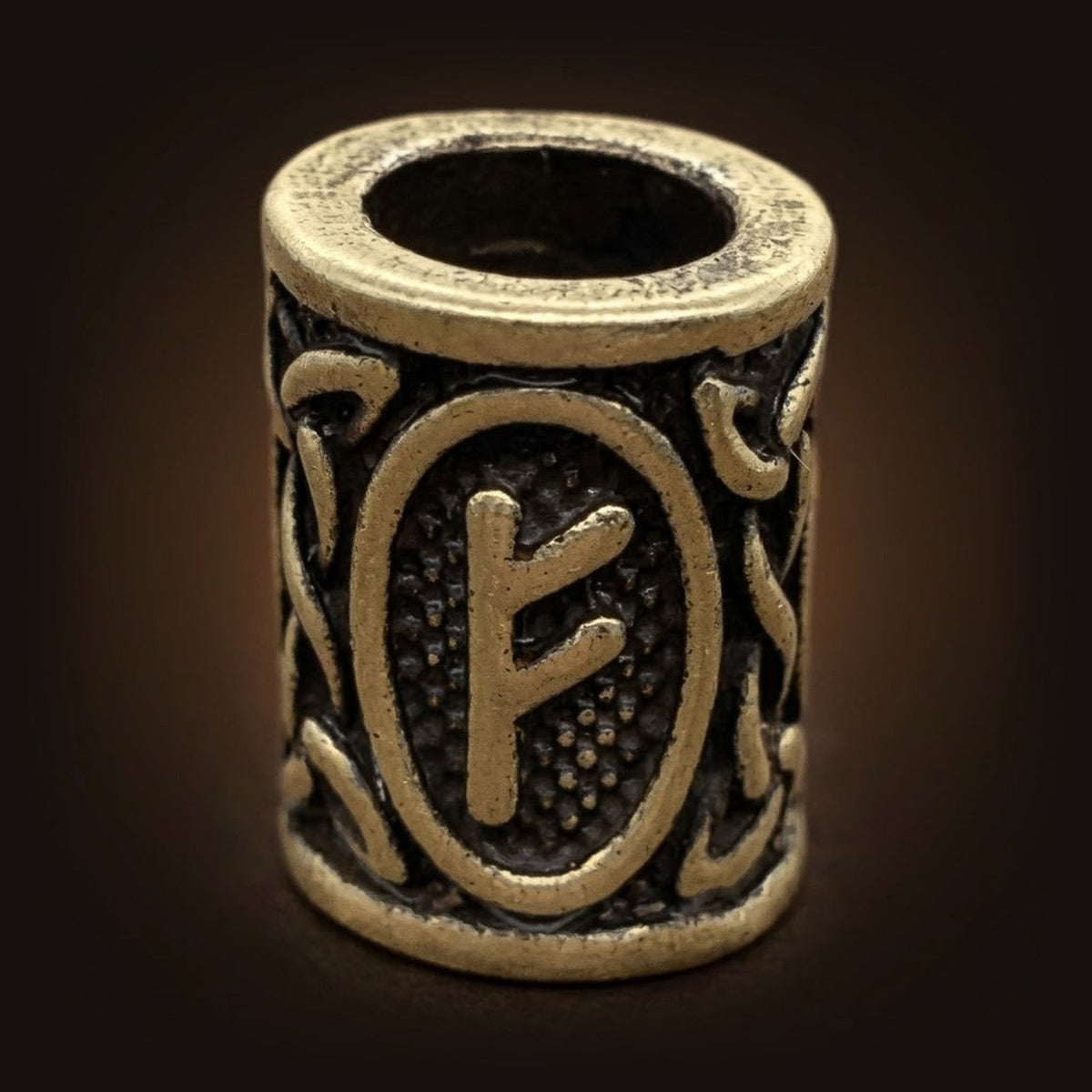 Perle viking cylindrique en alliage bronze patiné, rune Fehu, perçage traversant visible