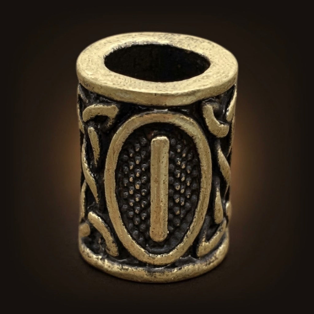 Perle viking cylindrique en alliage bronze patiné, rune Isa, perçage traversant visible