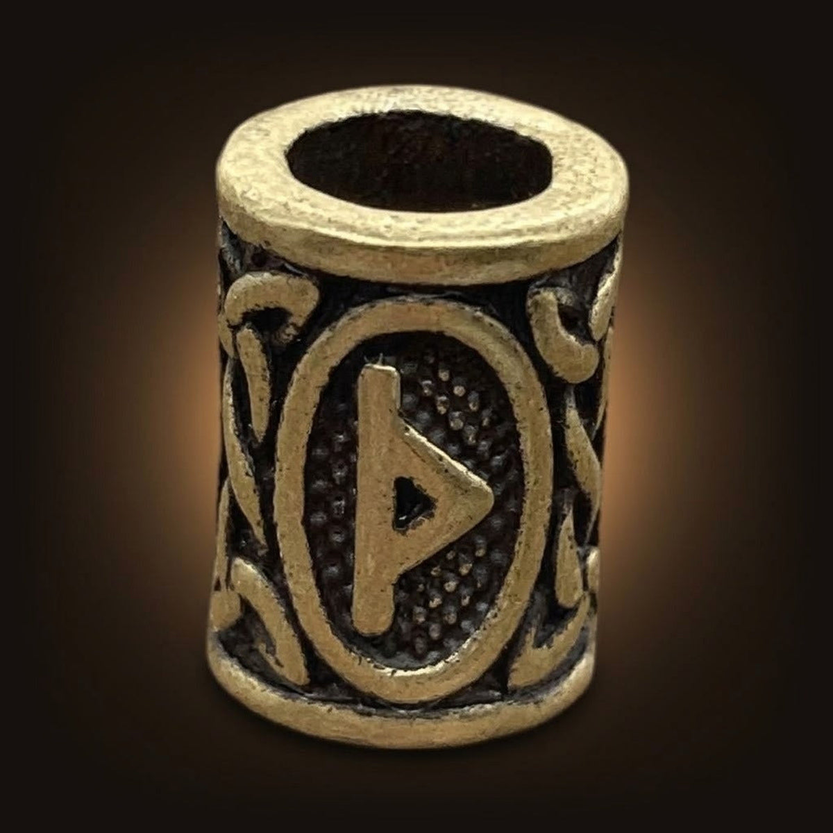 Perle viking cylindrique en alliage bronze patiné, rune Thurisaz, perçage traversant visible