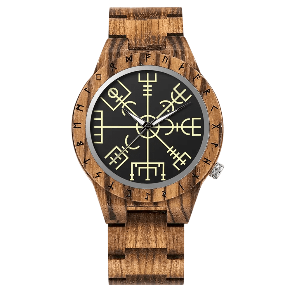 Montre Viking en bois noir profond (santal ou ébène) avec le symbole Vegvisir doré sur le cadran. Modèle La Boussole des Ténèbres avec runes gravées.