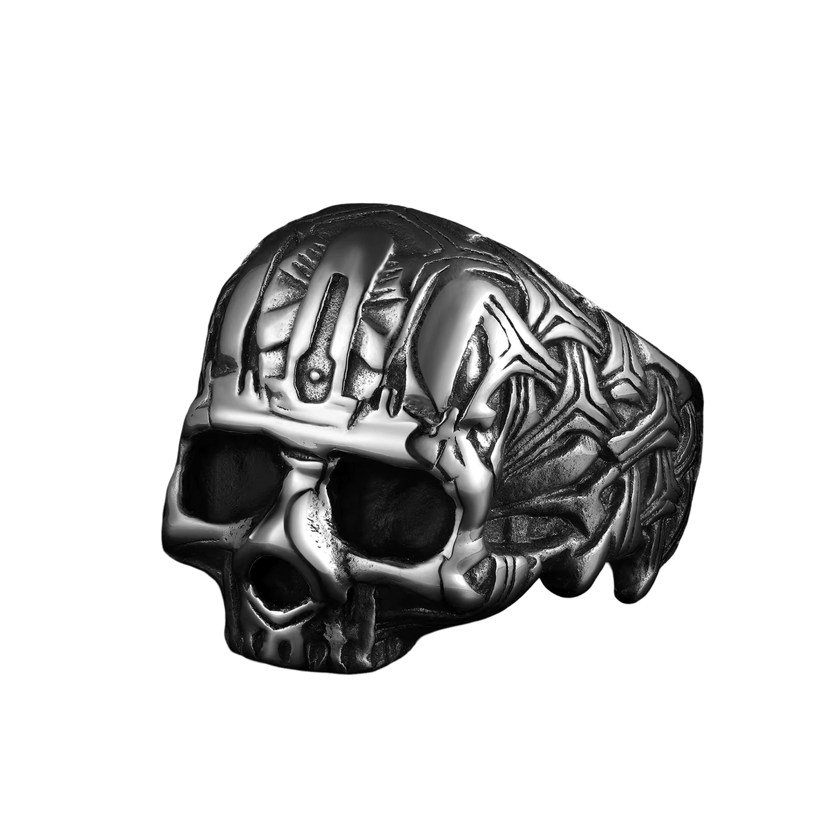 Bague en acier en forme de crâne sculpté en volume, front et tempes gravés de motifs entrelacés