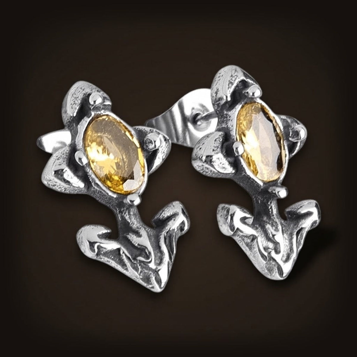 Puces d'oreilles ancre en acier inoxydable, deux bras recourbés surmontés d'un zircon citrine ovale