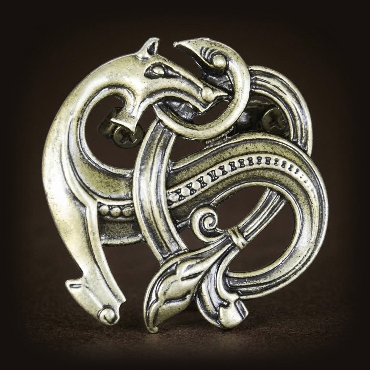 Broche viking ajourée, bête-ruban de style Urnes, alliage finition bronze