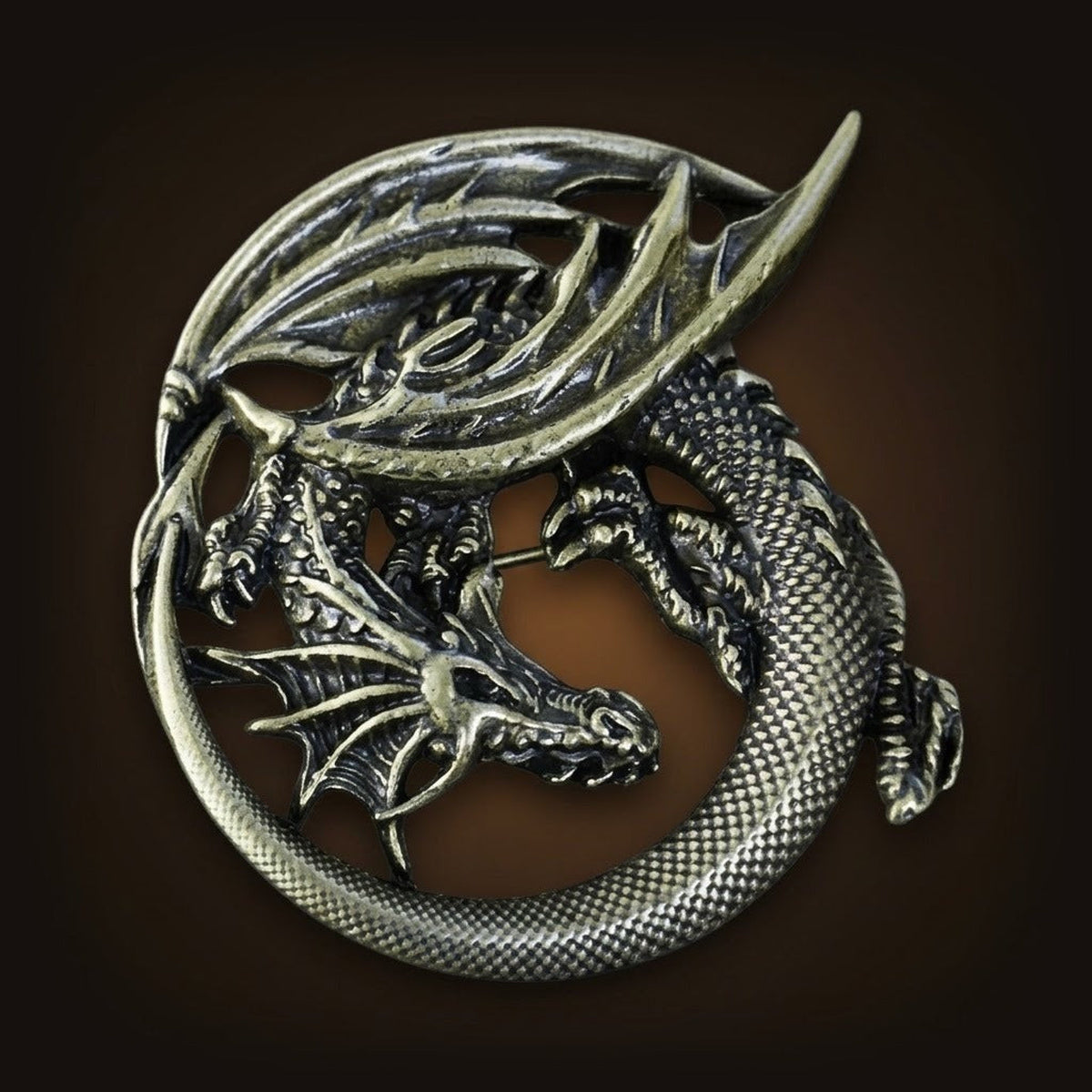 Broche viking ajourée, dragon lové en anneau, alliage finition bronze