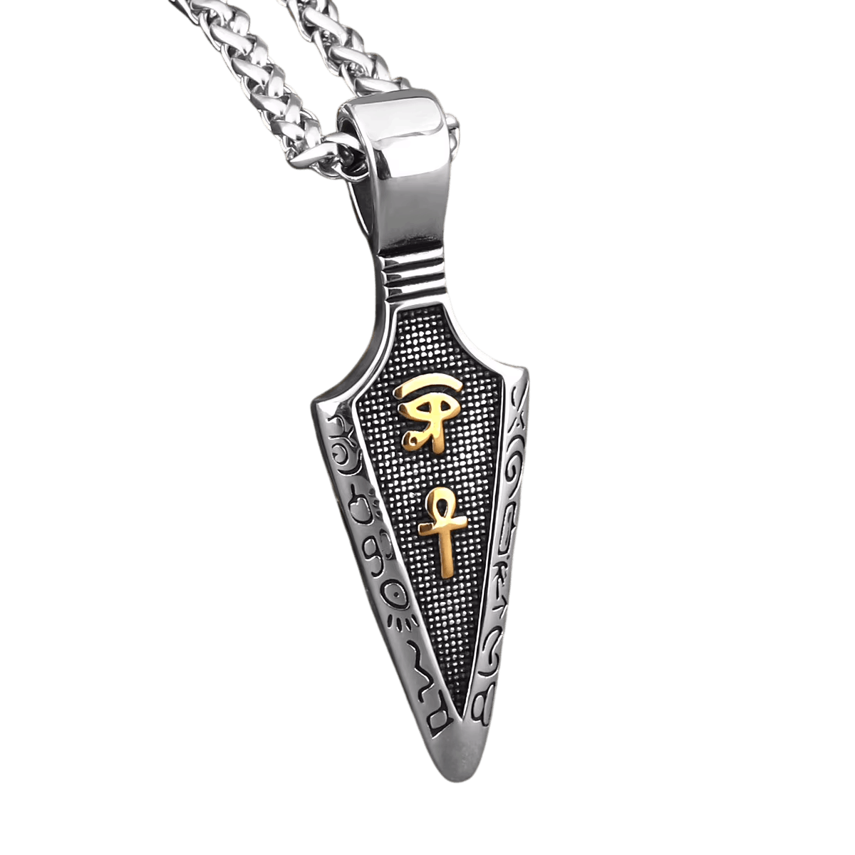 Pendentif égyptien en acier gravé de l'Œil d'Horus, de l'Ankh et de hiéroglyphes, en finition argentée, noire et dorée, sur fond blanc