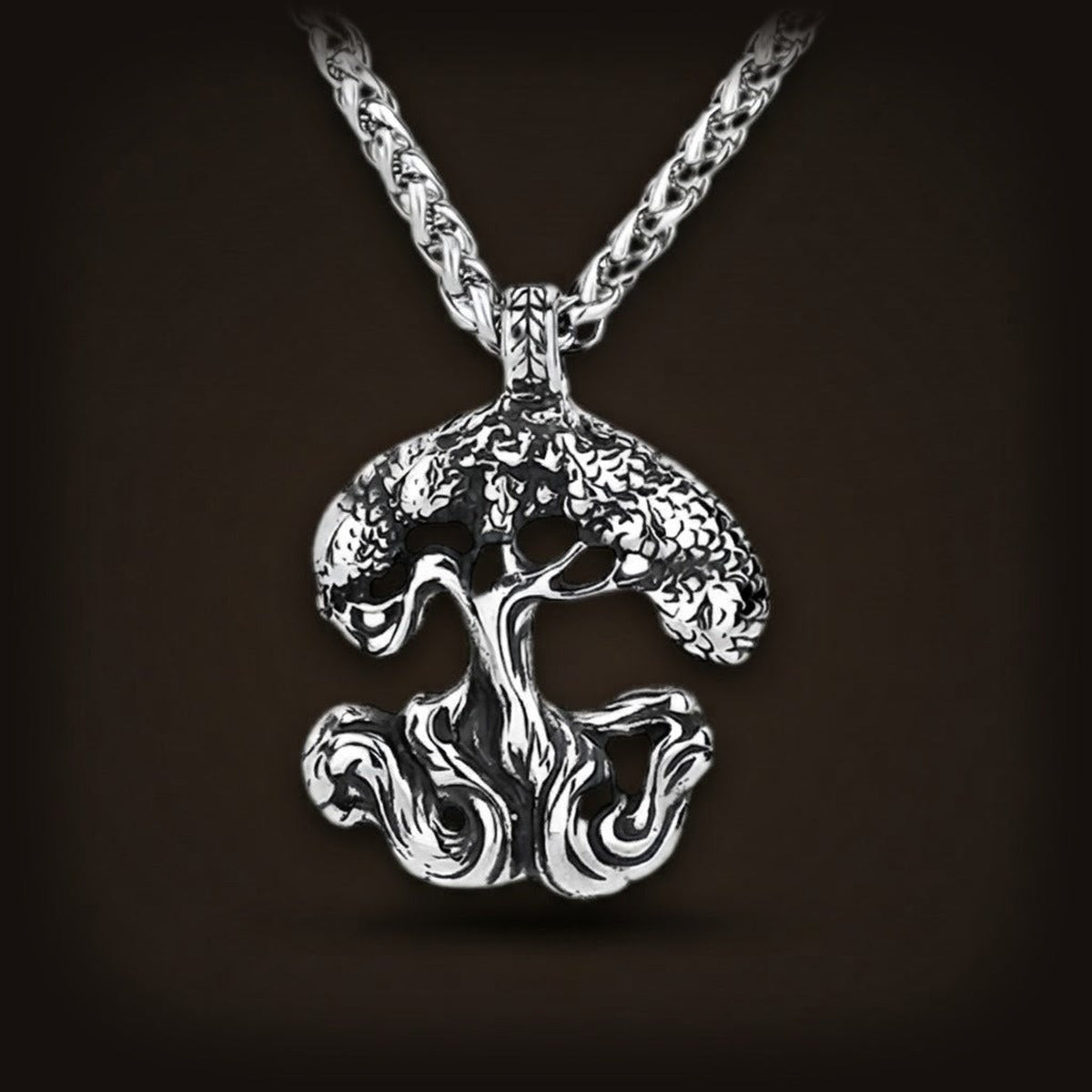 Pendentif arbre de vie Yggdrasil en acier inoxydable, branches et racines en relief, sur sa chaîne tressée