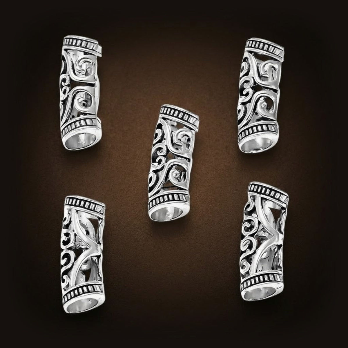 Lot de tubes de tresse vikings ajourés à finition argent vieilli, motif de volutes découpé