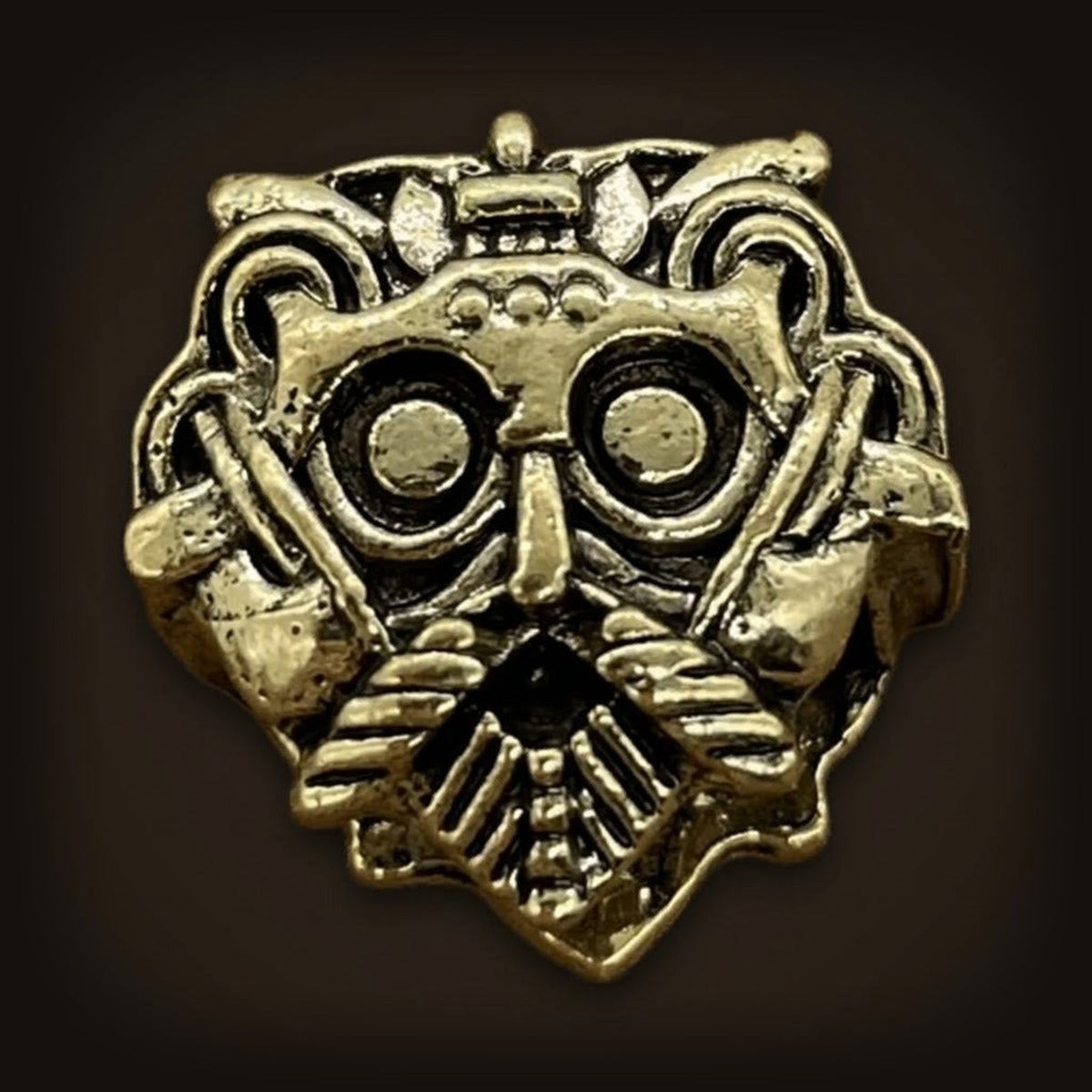 Perle viking en forme de masque, en alliage bronze patiné, masque barbu en relief, perçage traversant visible
