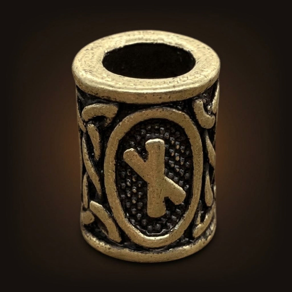 Perle viking cylindrique en alliage bronze patiné, rune Nauthiz, perçage traversant visible