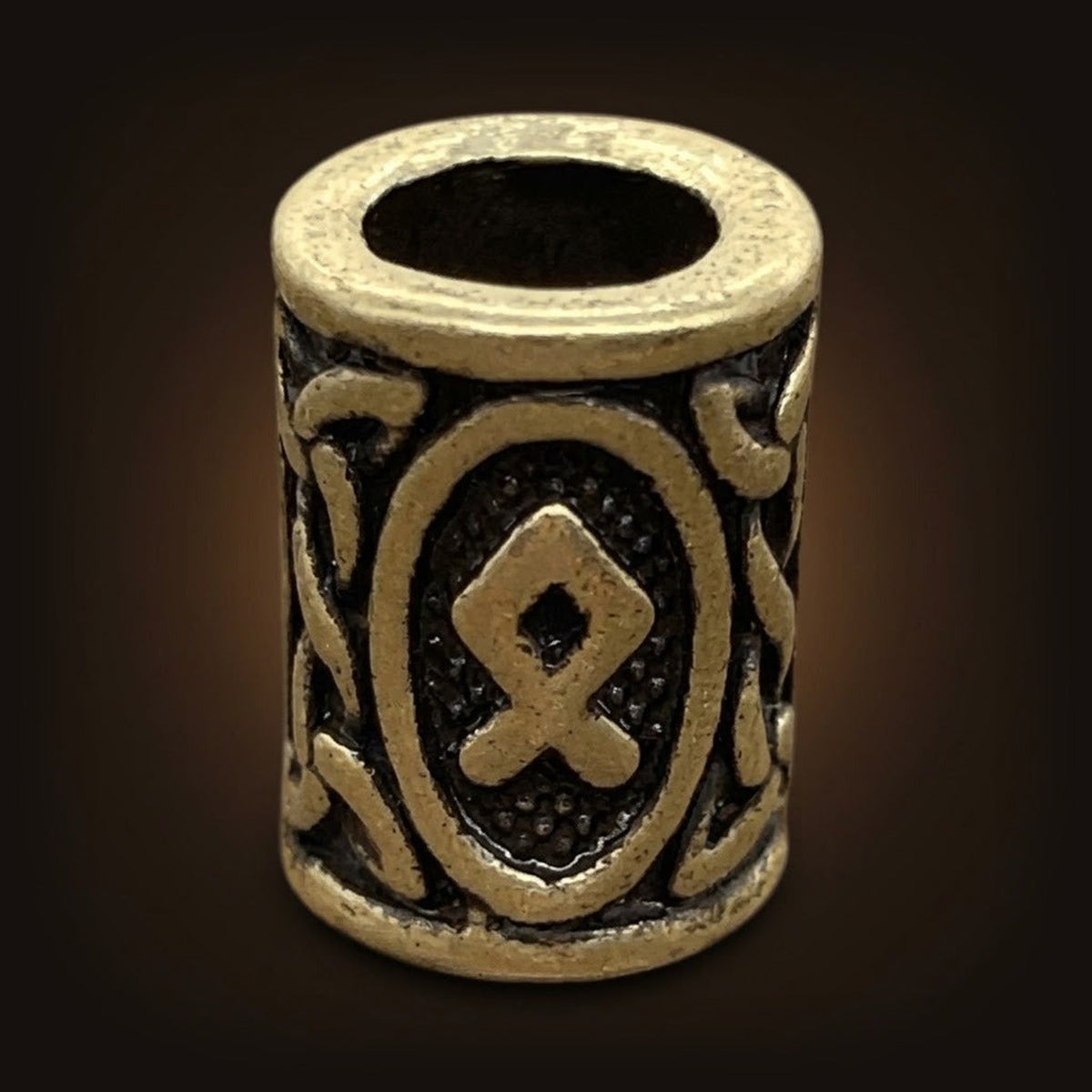 Perle viking cylindrique en alliage bronze patiné, rune Othala, perçage traversant visible