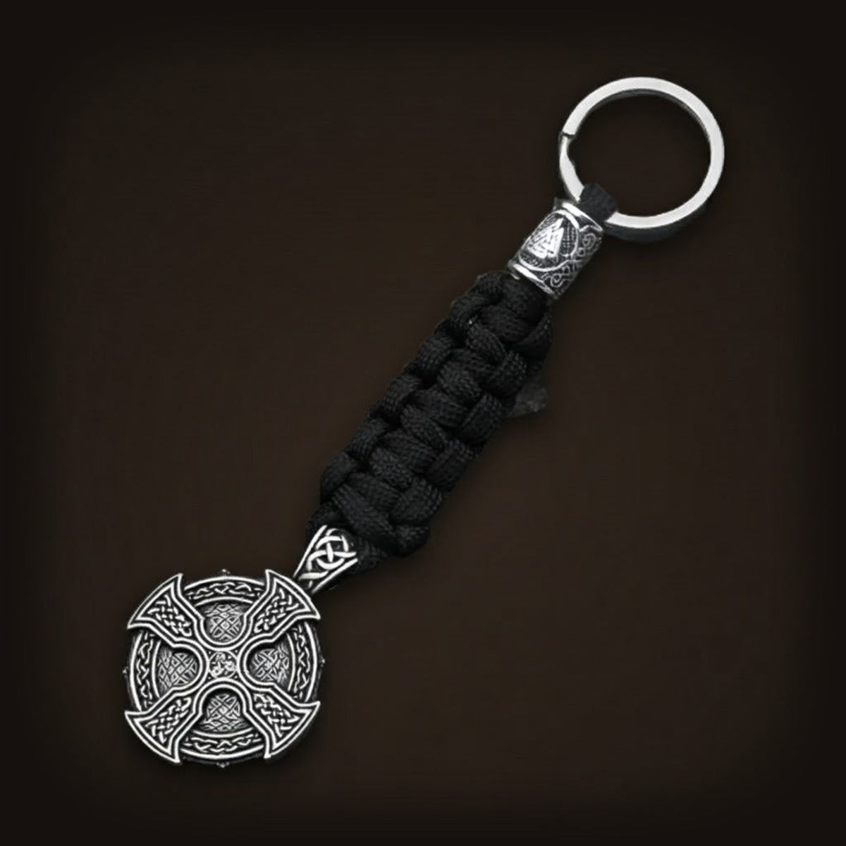 Porte-clés viking en paracorde noire tressée, médaillon croix celtique à entrelacs et perle Valknut, finition argent vieilli